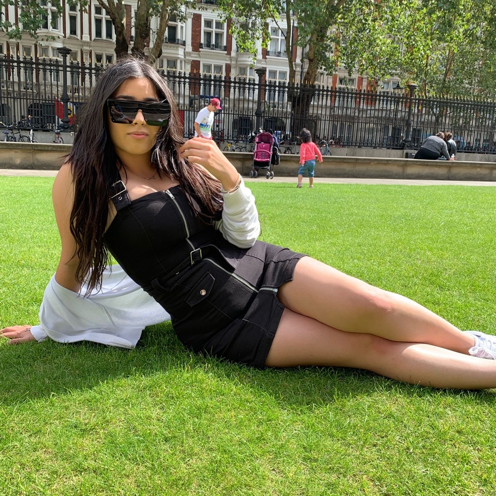 Black dress . I am a size6 but fit into this size4